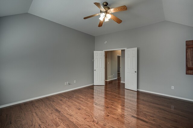 unfurnished room with ceiling fan, wood-type flooring, and lofted ceiling