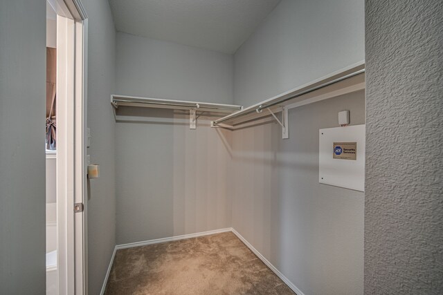 laundry room featuring washer hookup, light tile patterned floors, and hookup for an electric dryer