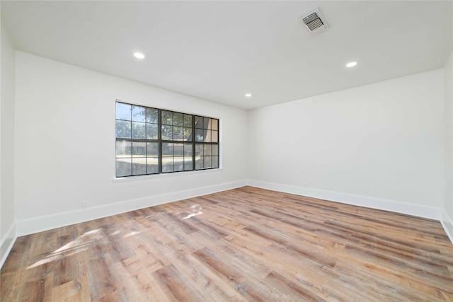 empty room with light wood-type flooring