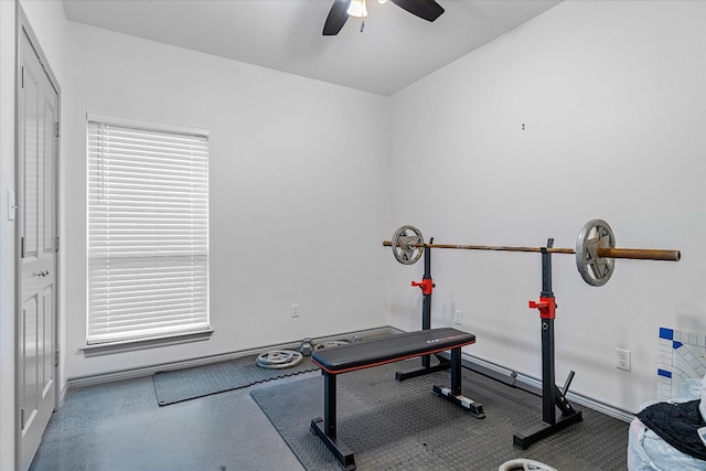 exercise room with ceiling fan