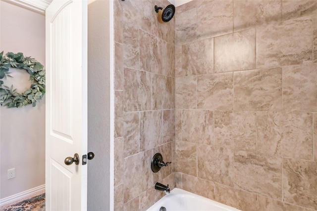 room details featuring tiled shower / bath