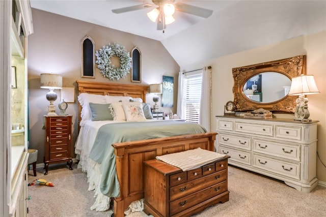 bedroom featuring light carpet, ceiling fan, and lofted ceiling