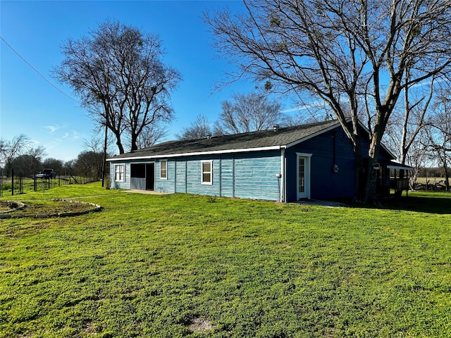 exterior space with a yard