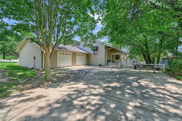 ranch-style home with a garage