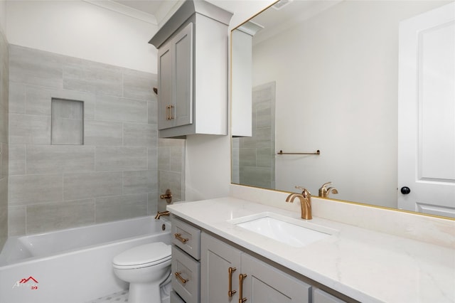 full bathroom with tiled shower / bath combo, toilet, and vanity