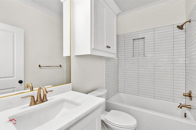 full bathroom featuring ornamental molding, vanity, toilet, and tiled shower / bath