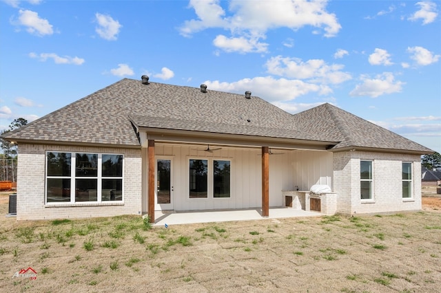 back of house with a patio area