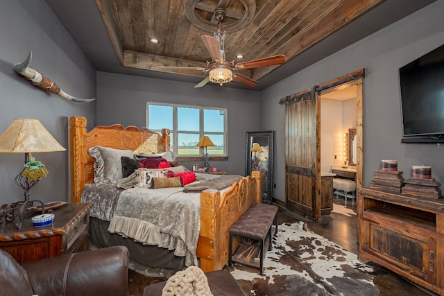 bedroom with wood ceiling, ceiling fan, and a raised ceiling