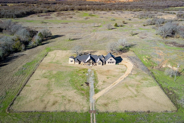 birds eye view of property featuring a rural view