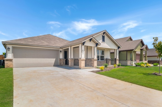 craftsman inspired home with a garage, central air condition unit, and a front yard