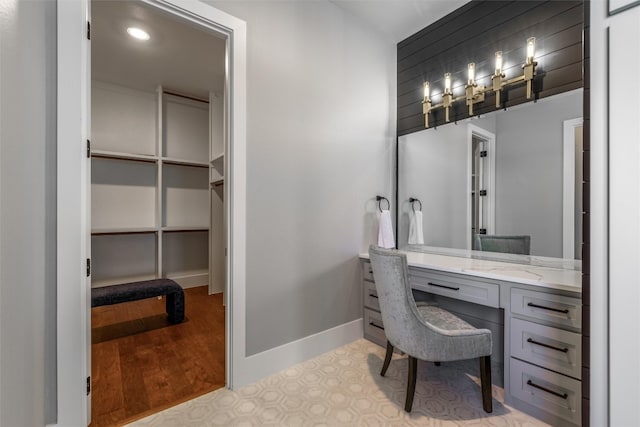 bathroom with vanity and hardwood / wood-style floors