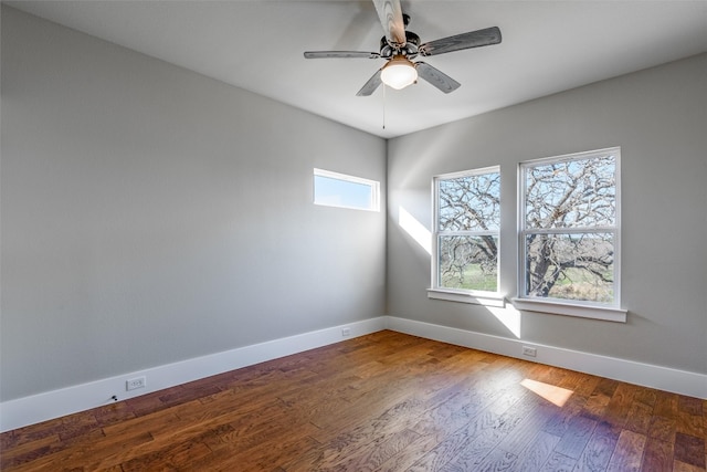 empty room with ceiling fan and wood-type flooring