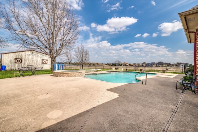 view of swimming pool with a patio area