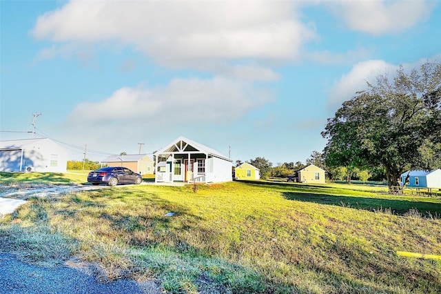 exterior space featuring a front yard