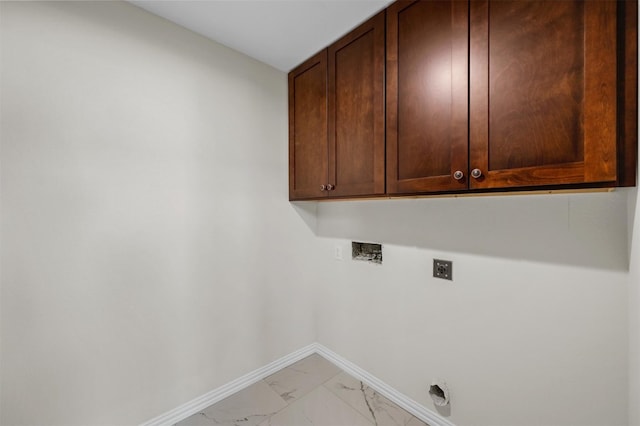 laundry room with washer hookup, cabinets, electric dryer hookup, and light tile floors