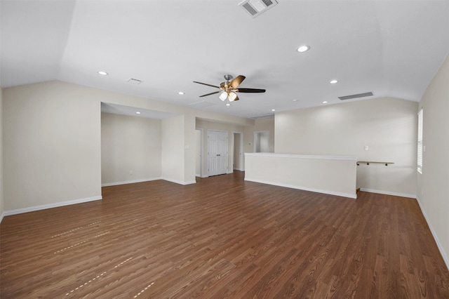 interior space with ceiling fan, dark wood-type flooring, and vaulted ceiling