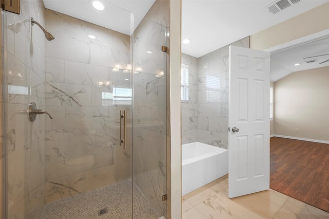 bathroom with separate shower and tub and hardwood / wood-style floors