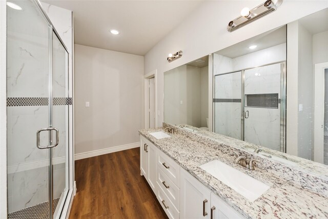 kitchen with appliances with stainless steel finishes, wooden counters, white cabinetry, and dark hardwood / wood-style floors