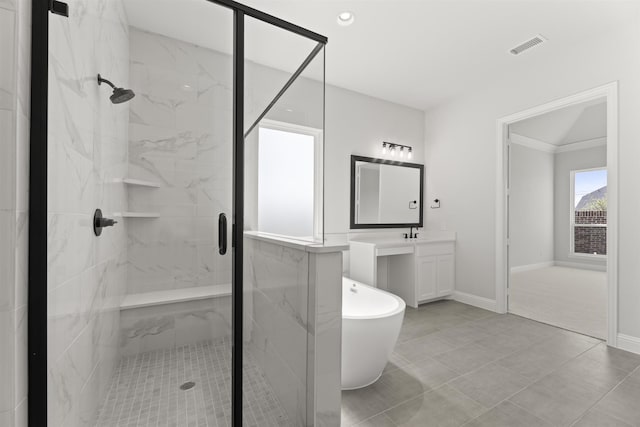 bathroom featuring vanity, tile patterned floors, and independent shower and bath