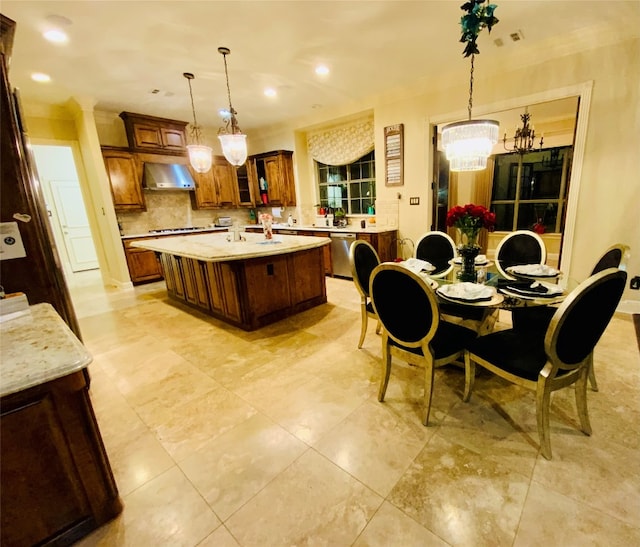 kitchen featuring a kitchen island with sink, light tile flooring, wall chimney range hood, stainless steel dishwasher, and tasteful backsplash