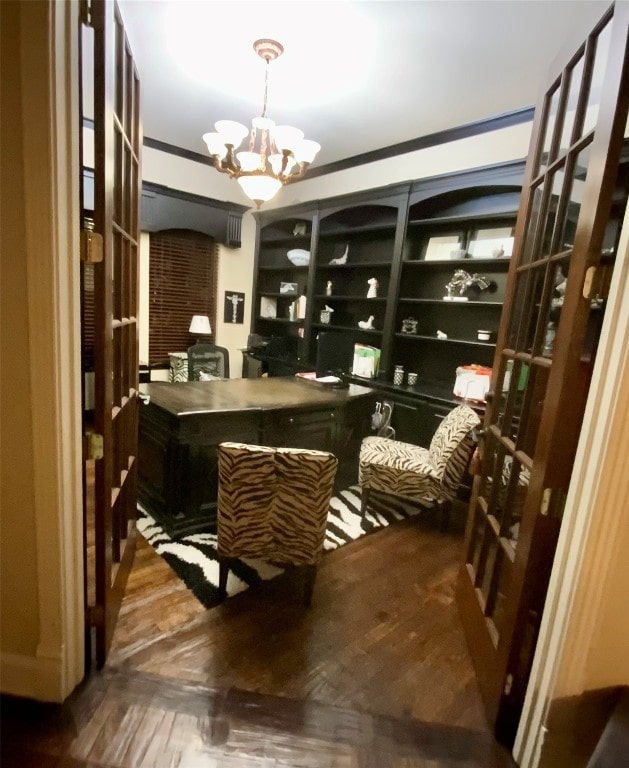 wine room with wood-type flooring, french doors, crown molding, and an inviting chandelier