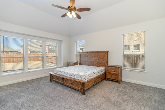 bedroom featuring light carpet, ceiling fan, and vaulted ceiling