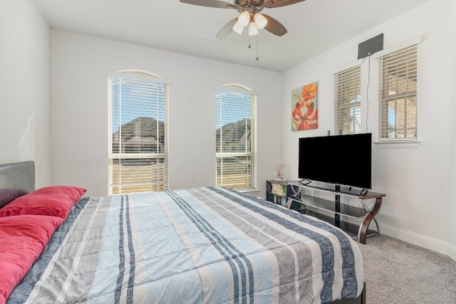 bedroom with light carpet and ceiling fan