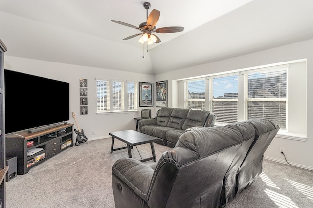 living room featuring light colored carpet, lofted ceiling, and ceiling fan