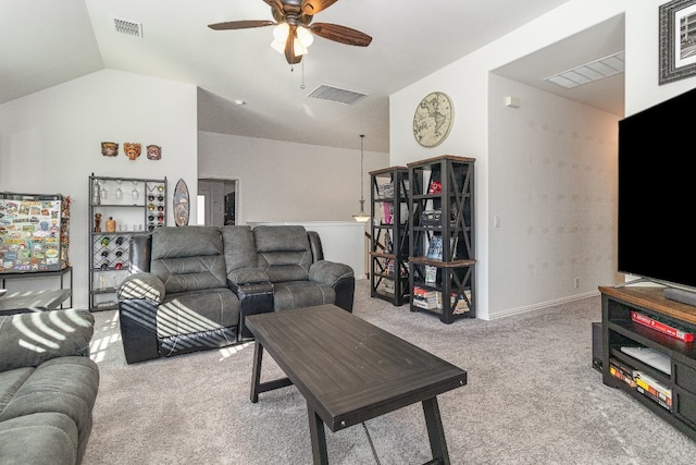 carpeted living room featuring lofted ceiling and ceiling fan