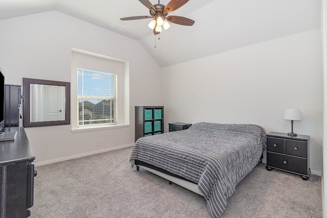 carpeted bedroom featuring vaulted ceiling and ceiling fan