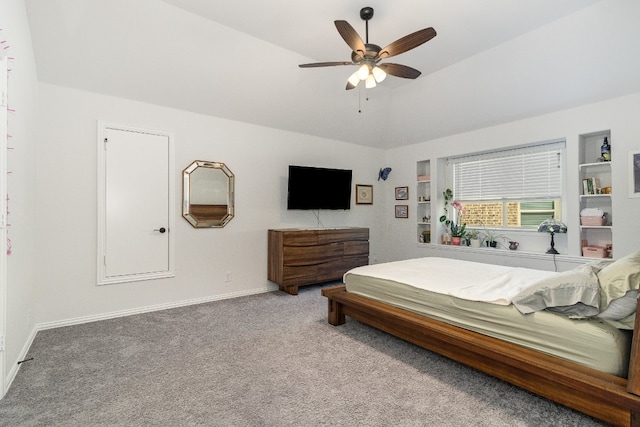 bedroom featuring lofted ceiling, ceiling fan, and light carpet