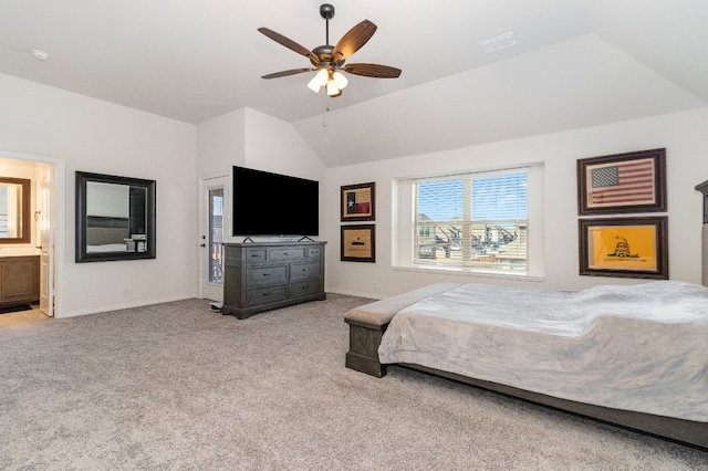 carpeted bedroom featuring ensuite bath, ceiling fan, and lofted ceiling