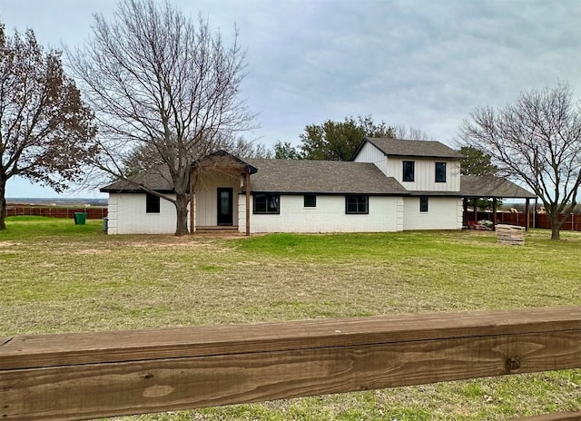 view of front of home with a front lawn