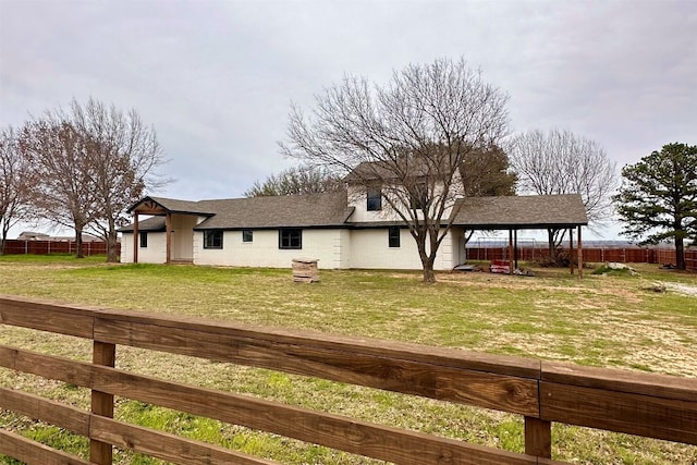 view of front of property with a gazebo and a front lawn