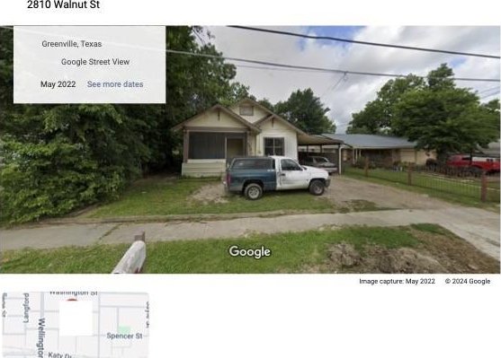 view of front of property with a carport