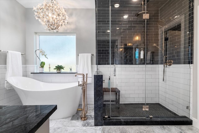 bathroom featuring independent shower and bath and tile walls