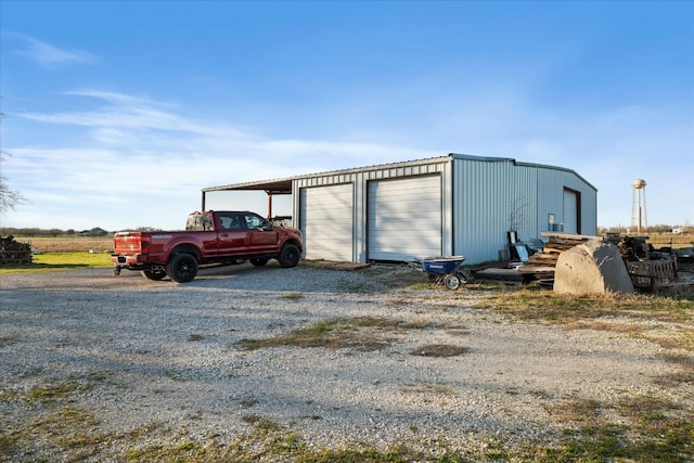 view of outbuilding featuring a garage