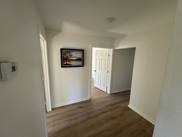 hall featuring dark hardwood / wood-style floors