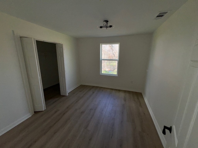 spare room with light hardwood / wood-style flooring