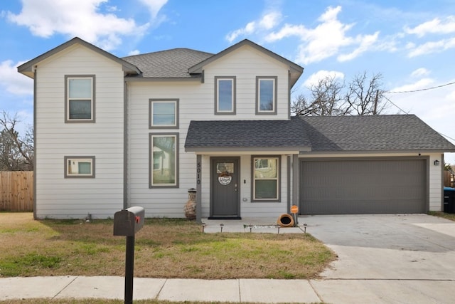 view of front facade with a front lawn and a garage