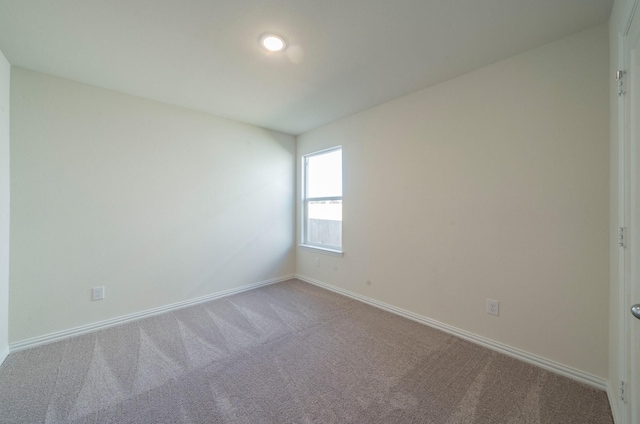 empty room with carpet floors