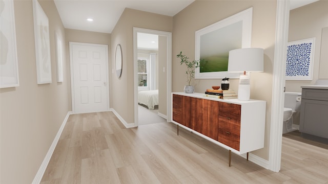 hallway featuring light hardwood / wood-style flooring