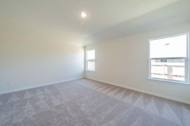 unfurnished room featuring carpet flooring