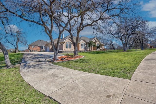 single story home with a front lawn