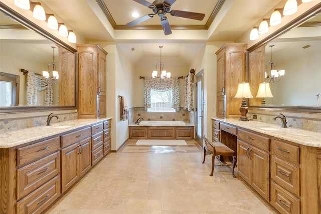 bathroom featuring a tray ceiling, ceiling fan with notable chandelier, ornamental molding, a bathing tub, and tile patterned flooring