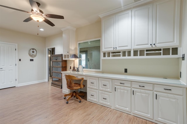 office area featuring light wood-type flooring and ceiling fan