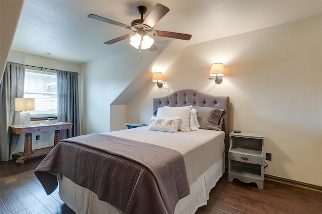 bedroom featuring dark hardwood / wood-style flooring and ceiling fan