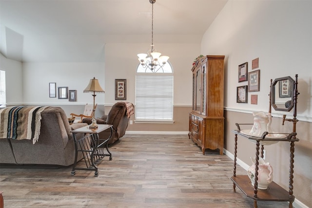 interior space featuring a notable chandelier and hardwood / wood-style floors