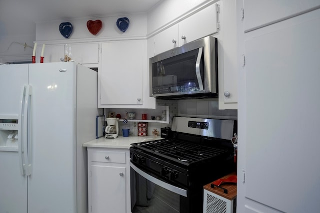 kitchen with white cabinets and stainless steel appliances