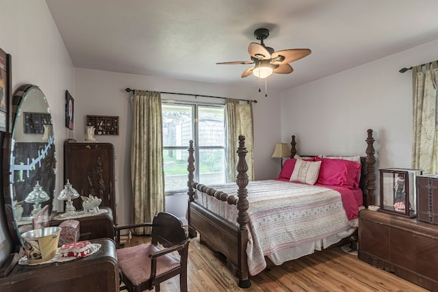 bedroom featuring light hardwood / wood-style floors and ceiling fan